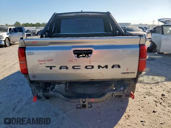 ✅ 2025 Toyota Tacoma Limited Hybrid • VIN: 3TYLC5LN7ST028746 • Lot: 92303225. Listed on Copart with 12,099 mi. Free auction sales archive from the USA and detailed vehicle history report at DreamBid. Image 6.