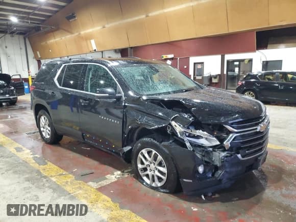 ✅ 2021 Chevrolet Traverse LT Cloth • VIN: 1GNEVGKW3MJ235078 • Lot: 90595675. Listed on Copart with 66,946 mi. Free auction sales archive from the USA and detailed vehicle history report at DreamBid. Image 4.