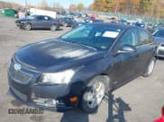 ✅ 2014 Chevrolet Cruze 1LT • VIN: 1G1PC5SB3E7363823 • Lot: 43610493. Listed on IAAI with 185,881 mi. Free auction sales archive from the USA and detailed vehicle history report at DreamBid. Image 2.