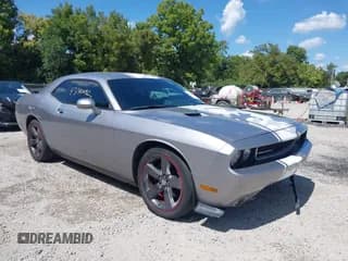 ✅ 2013 Dodge Challenger SXT • VIN: 2C3CDYAG6DH680794 • Lot: 43140092. Wystawiony na IAAI z przebiegiem 162 518 mil. Bezpłatny archiwum sprzedaży aukcyjnych z USA i szczegółowy raport historii pojazdu na DreamBid. Zdjęcie 1.