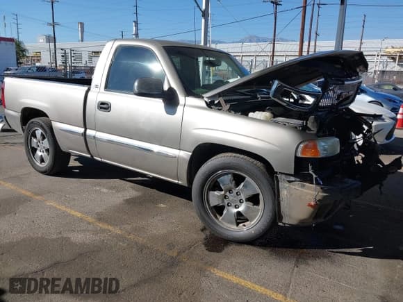 ✅ 2002 GMC Sierra 1500 SL • VIN: 1GTEC14V42Z216330 • Lot: 43535874. Listed on IAAI with 152,947 mi. Free auction sales archive from the USA and detailed vehicle history report at DreamBid. Image 1.