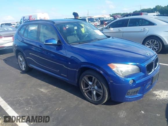 ✅ 2014 BMW X1 xDrive28i • VIN: WBAVL1C54EVY20003 • Lot: 43036828. Listed on IAAI with 138,476 mi. Free auction sales archive from the USA and detailed vehicle history report at DreamBid. Image 1.