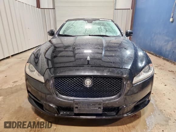 ✅ 2013 Jaguar XJ Portfolio • VIN: SAJWA2GB4DLV51516 • Lot: 60646925. Listed on Copart with 141,309 mi. Free auction sales archive from the USA and detailed vehicle history report at DreamBid. Image 5.