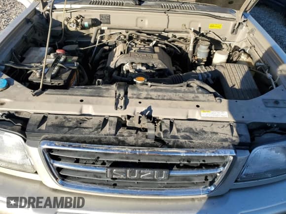 ✅ 1999 Isuzu Trooper S • VIN: JACDJ58X1X7931474 • Lot: 80273494. Listed on Copart with 295,128 mi. Free auction sales archive from the USA and detailed vehicle history report at DreamBid. Image 11.