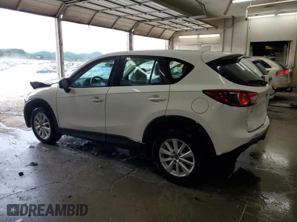 ✅ 2014 Mazda CX-5 Sport • VIN: JM3KE2BE2E0337119 • Lot: 57877765. Listed on Copart with 121,177 mi. Free auction sales archive from the USA and detailed vehicle history report at DreamBid. Image 2.