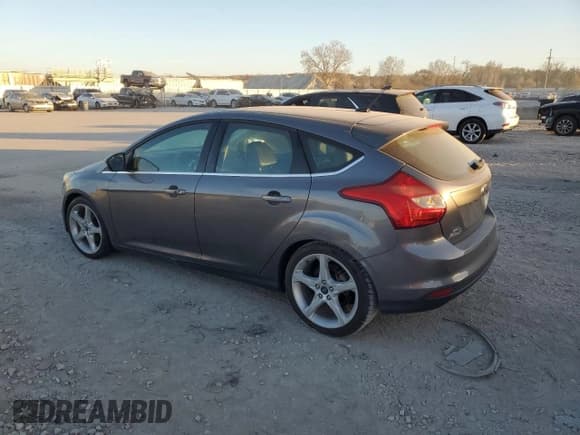 ✅ 2014 Ford Focus Titanium • VIN: 1FADP3N22EL141379 • Lot: 92607195. Listed on Copart with 138,728 mi. Free auction sales archive from the USA and detailed vehicle history report at DreamBid. Image 2.