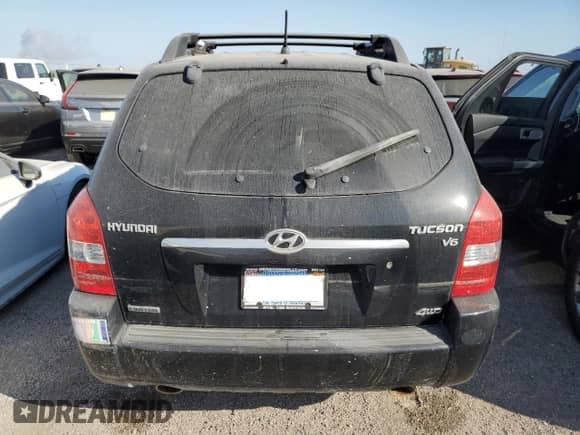 2007 Hyundai Tucson SE z VIN KM8JN72D77U483564, wystawiony jako Copart lot #75153254 z przebiegiem Nie podano mil oraz Szkoda całkowita • Salvage title. Historia ofert i sprzedaży dostępna na DreamBid. Obrazek 6.