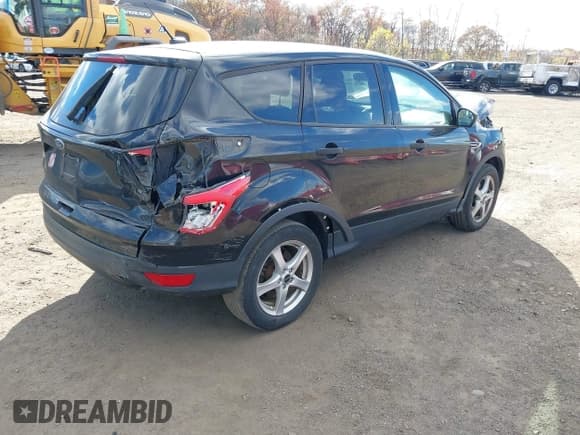 ✅ 2017 Ford Escape S • VIN: 1FMCU0F7XHUA26384 • Lot: 43631016. Listed on IAAI with 69,188 mi. Free auction sales archive from the USA and detailed vehicle history report at DreamBid. Image 4.