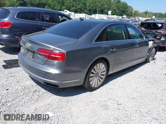 ✅ 2015 Audi A8 4.0T • VIN: WAU32AFD6FN024626 • Lot: 42978163. Wystawiony na IAAI z przebiegiem 143 595 mil. Bezpłatny archiwum sprzedaży aukcyjnych z USA i szczegółowy raport historii pojazdu na DreamBid. Zdjęcie 4.