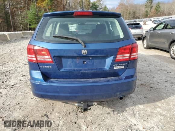 2010 Dodge Journey SE with VIN 3D4PG4FB6AT198651, listed as a Copart auction lot 90991705 with 102,501 mi miles and Clean title. Bid and sale history available at DreamBid. Image 6.