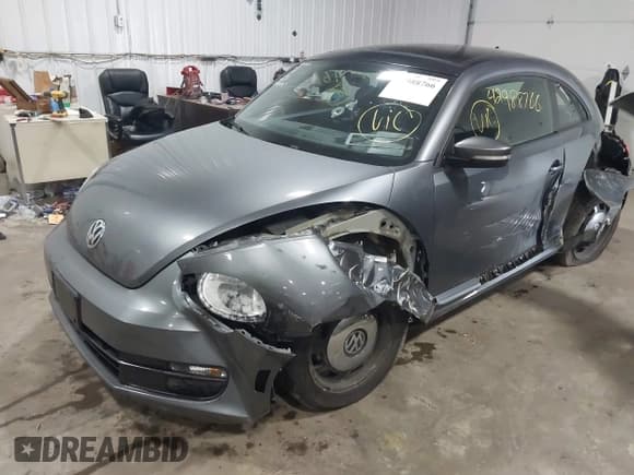 ✅ 2015 Volkswagen Beetle 1.8T • VIN: 3VWJ17AT9FM621081 • Lot: 42988766. Listed on IAAI with 69,997 mi. Free auction sales archive from the USA and detailed vehicle history report at DreamBid. Image 2.