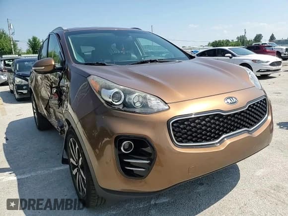 ✅ 2018 Kia Sportage EX • VIN: KNDPNCAC1J7390125 • Лот: 68938115. Опубликован ранее на Copart с пробегом 63 027 миль. Бесплатный доступ к архиву аукционных продаж из США и подробный отчёт об истории автомобиля на DreamBid. Изображение 14.