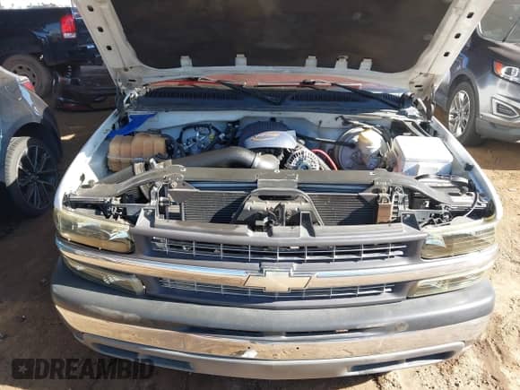 2005 Chevrolet Silverado 1500 LS z VIN 1GCEC19T75Z304025, wystawiony jako IAAI lot #43584015 z przebiegiem 126 228 mil mil oraz . Historia ofert i sprzedaży dostępna na DreamBid. Obrazek 10.