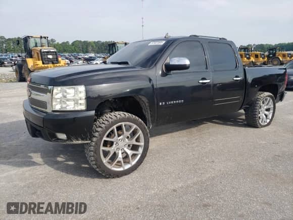 2007 Chevrolet Silverado 1500 LTZ with VIN 2GCEK13M671558499, listed as a Copart auction lot 57407085 with 195,637 mi miles and Salvage title. Bid and sale history available at DreamBid. Image 1.