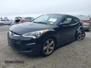 2012 Hyundai Veloster w/Red Int z VIN KMHTC6AD8CU072100, wystawiony jako IAAI lot #43427707 z przebiegiem 178 258 mil mil oraz . Historia ofert i sprzedaży dostępna na DreamBid. Obrazek 2.