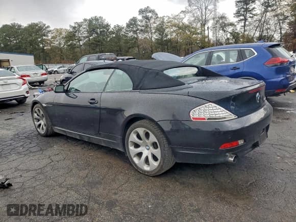 ✅ 2005 BMW 6 Series 645Ci • VIN: WBAEK73405B325215 • Лот: 93490225. Опубликован ранее на Copart с пробегом 127 369 миль. Бесплатный доступ к архиву аукционных продаж из США и подробный отчёт об истории автомобиля на DreamBid. Изображение 2.