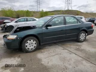 ✅ 1998 Honda Accord LX • VIN: 1HGCG554XWA252604 • Lot: 56232105. Listed on Copart with 103,930 mi. Free auction sales archive from the USA and detailed vehicle history report at DreamBid. Image 1.