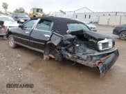 ✅ 2000 Lincoln Town Car Signature • VIN: 1LNHM82W1YY936080 • Lot: 43287202. Wystawiony na IAAI z przebiegiem 162 731 mil. Bezpłatny archiwum sprzedaży aukcyjnych z USA i szczegółowy raport historii pojazdu na DreamBid. Zdjęcie 3.