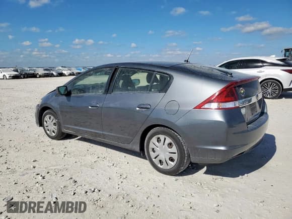 ✅ 2013 Honda Insight LX • VIN: JHMZE2H59DS003833 • Lot: 92709585. Listed on Copart with Not provided. Free auction sales archive from the USA and detailed vehicle history report at DreamBid. Image 2.