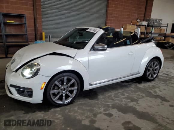 ✅ 2014 Volkswagen Beetle 2.0L TDI • VIN: 3VW5L7AT8EM817815 • Lot: 48077945. Listed on Copart with 63,015 mi. Free auction sales archive from the USA and detailed vehicle history report at DreamBid. Image 1.