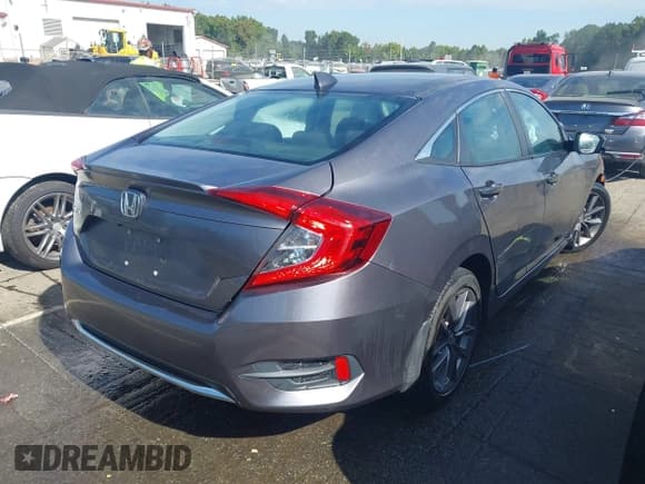 ✅ 2021 Honda Civic EX • VIN: 19XFC1F34ME011217 • Lot: 43251933. Listed on IAAI with 47,511 mi. Free auction sales archive from the USA and detailed vehicle history report at DreamBid. Image 4.