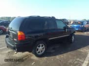 ✅ 2009 GMC Envoy SLE • VIN: 1GKDT33S392129850 • Lot: 31422137. Listed on IAAI with 165,120 mi. Free auction sales archive from the USA and detailed vehicle history report at DreamBid. Image 4.