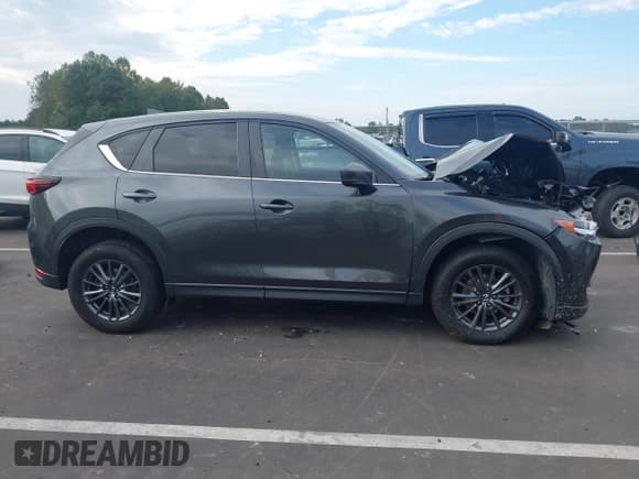 ✅ 2021 Mazda CX-5 Touring • VIN: JM3KFBCM7M0496218 • Lot: 43322405. Wystawiony na IAAI z przebiegiem 61 558 mil. Bezpłatny archiwum sprzedaży aukcyjnych z USA i szczegółowy raport historii pojazdu na DreamBid. Zdjęcie 13.