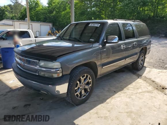 ✅ 2001 Chevrolet Suburban LS • VIN: 3GNEC16T11G283940 • Lot: 52162715. Wystawiony na Copart z przebiegiem 197 628 mil. Bezpłatny archiwum sprzedaży aukcyjnych z USA i szczegółowy raport historii pojazdu na DreamBid. Zdjęcie 1.