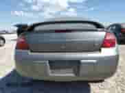 2005 Dodge Neon SXT z VIN 1B3ES56C95D201704, wystawiony jako Copart lot #59340935 z przebiegiem 119 066 mil mil oraz Szkoda całkowita • Salvage title. Historia ofert i sprzedaży dostępna na DreamBid. Obrazek 6.