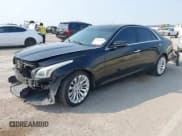 ✅ 2015 Cadillac CTS Luxury RWD • VIN: 1G6AR5SX2F0141438 • Lot: 43004019. Listed on IAAI with 143,885 mi. Free auction sales archive from the USA and detailed vehicle history report at DreamBid. Image 2.