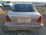 ✅ 2000 Mercedes-Benz C 230/260/280/320 • VIN: WDBHA29GXYA856258 • Lot: 80350404. Wystawiony na Copart z przebiegiem 245 687 mil. Bezpłatny archiwum sprzedaży aukcyjnych z USA i szczegółowy raport historii pojazdu na DreamBid. Zdjęcie 6.