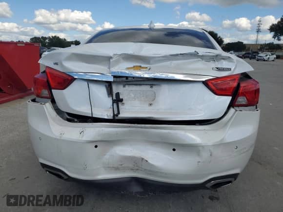 2017 Chevrolet Impala Premier z VIN 2G1145S32H9145788, wystawiony jako Copart lot #87188465 z przebiegiem 77 672 mil mil oraz Szkoda całkowita • Salvage title. Historia ofert i sprzedaży dostępna na DreamBid. Obrazek 6.