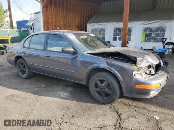 ✅ 1999 Nissan Maxima GXE • VIN: JN1CA21D8XT803822 • Lot: 64638365. Wystawiony na Copart z przebiegiem 203 700 mil. Bezpłatny archiwum sprzedaży aukcyjnych z USA i szczegółowy raport historii pojazdu na DreamBid. Zdjęcie 4.