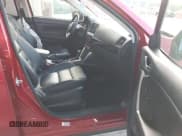 ✅ 2014 Mazda CX-5 Grand Touring • VIN: JM3KE4DY3E0424708 • Lot: 43349523. Wystawiony na IAAI z przebiegiem 75 283 mil. Bezpłatny archiwum sprzedaży aukcyjnych z USA i szczegółowy raport historii pojazdu na DreamBid. Zdjęcie 5.