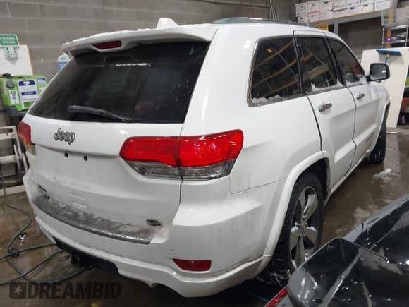 ✅ 2015 Jeep Grand Cherokee Overland • VIN: 1C4RJFCG2FC741015 • Лот: 41607606. Опубликован ранее на IAAI с пробегом 132 038 миль. Бесплатный доступ к архиву аукционных продаж из США и подробный отчёт об истории автомобиля на DreamBid. Изображение 4.