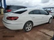 ✅ 2013 Volkswagen CC R-Line • VIN: WVWBP7AN2DE543477 • Lot: 93209515. Listed on Copart with 128,084 mi. Free auction sales archive from the USA and detailed vehicle history report at DreamBid. Image 3.