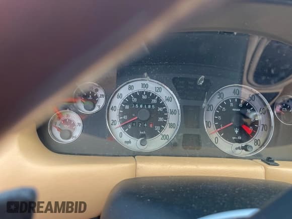 ✅ 2004 Maserati Coupe • VIN: ZAMBC38A940011479 • Lot: 76714584. Wystawiony na Copart z przebiegiem 58 185 mil. Bezpłatny archiwum sprzedaży aukcyjnych z USA i szczegółowy raport historii pojazdu na DreamBid. Zdjęcie 9.