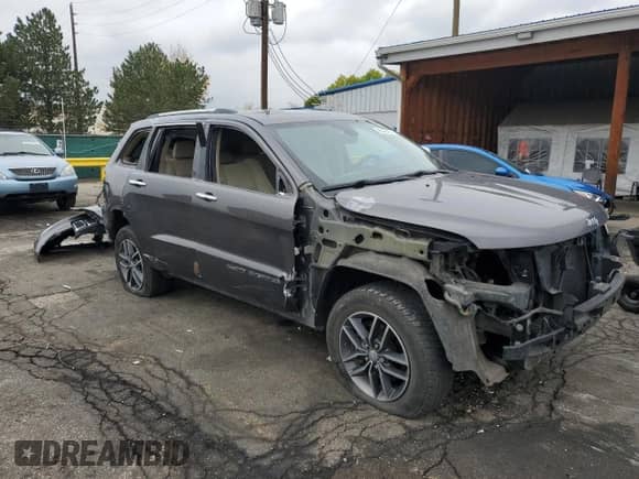 2017 Jeep Grand Cherokee Limited with VIN 1C4RJFBG7HC749101, listed as a Copart auction lot 85588465 with 128,807 mi miles and Salvage title. Bid and sale history available at DreamBid. Image 4.