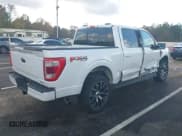 ✅ 2021 Ford F-150 Lariat • VIN: 1FTFW1E84MFC28437 • Lot: 43701783. Listed on IAAI with 140,891 mi. Free auction sales archive from the USA and detailed vehicle history report at DreamBid. Image 4.