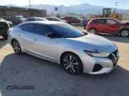 ✅ 2019 Nissan Maxima SL • VIN: 1N4AA6AV5KC377946 • Lot: 91626985. Listed on Copart with 136,052 mi. Free auction sales archive from the USA and detailed vehicle history report at DreamBid. Image 4.