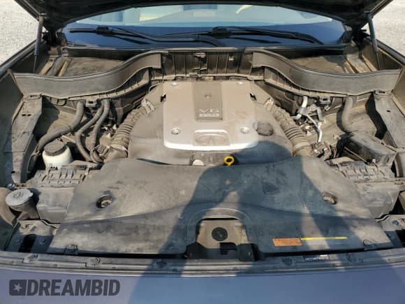 ✅ 2015 Infiniti QX70 • VIN: JN8CS1MW6FM482197 • Lot: 67227935. Wystawiony na Copart z przebiegiem 109 500 mil. Bezpłatny archiwum sprzedaży aukcyjnych z USA i szczegółowy raport historii pojazdu na DreamBid. Zdjęcie 12.