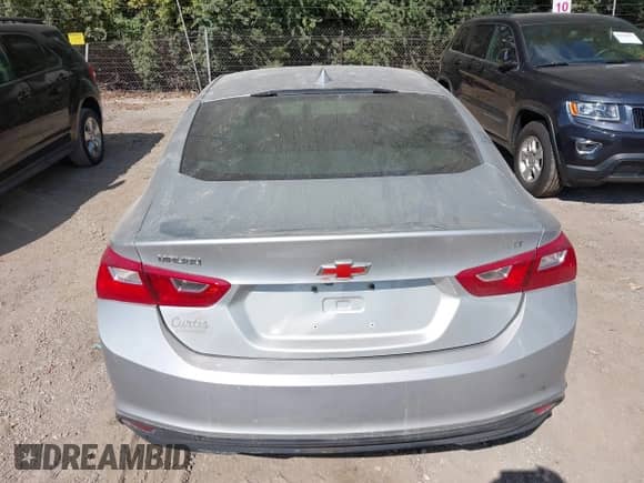 2016 Chevrolet Malibu LT z VIN 1G1ZE5ST5GF303756, wystawiony jako IAAI lot #43351963 z przebiegiem Nie podano mil oraz . Historia ofert i sprzedaży dostępna na DreamBid. Obrazek 16.