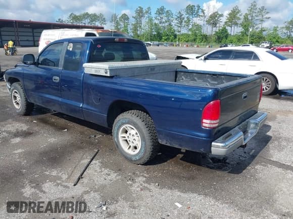 ✅ 2000 Dodge Dakota • VIN: 1B7GL22X3YS523895 • Lot: 42247540. Wystawiony na IAAI z przebiegiem 159 138 mil. Bezpłatny archiwum sprzedaży aukcyjnych z USA i szczegółowy raport historii pojazdu na DreamBid. Zdjęcie 3.