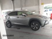 ✅ 2021 Lexus NX 300 • VIN: JTJGARDZ2M5031216 • Lot: 43402818. Wystawiony na IAAI z przebiegiem 50 780 mil. Bezpłatny archiwum sprzedaży aukcyjnych z USA i szczegółowy raport historii pojazdu na DreamBid. Zdjęcie 14.