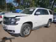 2015 Chevrolet Tahoe LT z VIN 1GNSKBKC3FR279459, wystawiony jako IAAI lot #43349972 z przebiegiem 112 043 mil mil oraz . Historia ofert i sprzedaży dostępna na DreamBid. Obrazek 17.