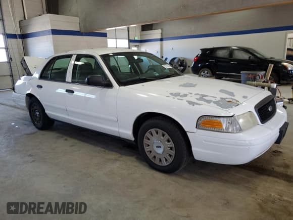 ✅ 2005 Ford Police Interceptor • VIN: 2FAHP71W35X144070 • Lot: 52170125. Listed on Copart with 124,687 mi. Free auction sales archive from the USA and detailed vehicle history report at DreamBid. Image 4.