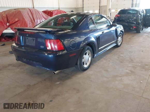 ✅ 2003 Ford Mustang Standard • VIN: 1FAFP404X3F384294 • Lot: 42160348. Listed on IAAI with 135,117 mi. Free auction sales archive from the USA and detailed vehicle history report at DreamBid. Image 4.