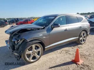 ✅ 2023 Genesis GV80 • VIN: KMUHCESC8PU130090 • Лот: 84251515. Опубликован ранее на Copart с пробегом 26 238 миль. Бесплатный доступ к архиву аукционных продаж из США и подробный отчёт об истории автомобиля на DreamBid. Изображение 1.
