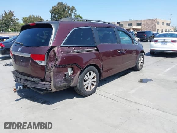 ✅ 2014 Honda Odyssey EX-L • VIN: 5FNRL5H6XEB034072 • Lot: 42437970. Listed on IAAI with 61,830 mi. Free auction sales archive from the USA and detailed vehicle history report at DreamBid. Image 4.