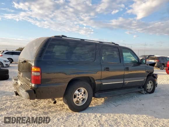 2003 Chevrolet Suburban Z71 z VIN 3GNFK16Z53G154565, wystawiony jako Copart lot #85582955 z przebiegiem 304 431 mil mil oraz Szkoda całkowita • Salvage title. Historia ofert i sprzedaży dostępna na DreamBid. Obrazek 3.